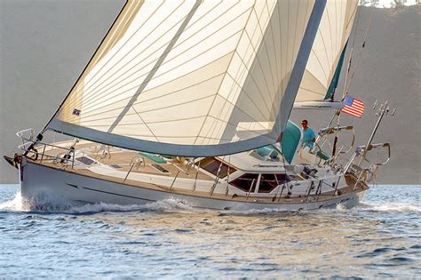 A genoa sail is attached all up the forestay, same as a regular jibsail, but spinnakers are not a genoa is a large jib or staysail that can extend beyond the mast overlapping the main sail when seen. Radial Hydranet Genoa — UK Sailmakers