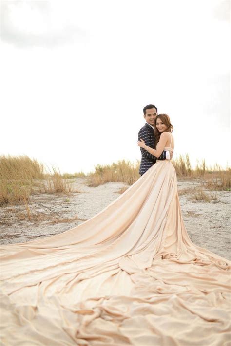 Bride Who Wore Extreme Long Gown On Her Prewedding Photoshoot Wedding