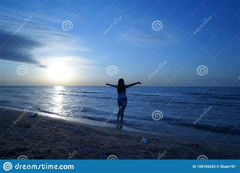 Woman Open Arms Under The Sunrise At Seaside Stock Image Image Of