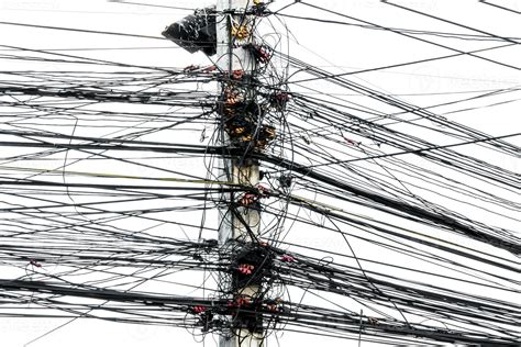 Messy Chaos Of Cables With Wires On Electric Pole On White Background