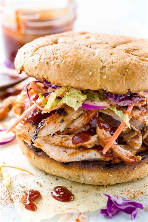 I think everyone has their own version of these sandwiches. Pulled Chicken Sandwiches with Coleslaw - Jessica Gavin