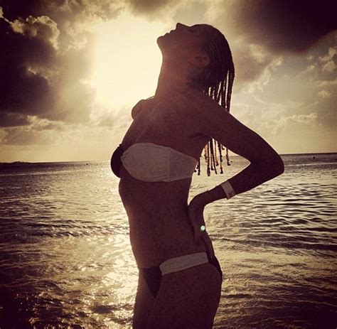 heidi klum strikes a white bikini in the bahamas sunset leopard curves