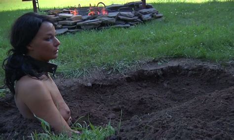 brunette leashed milf slut buried in the ground outdoors video
