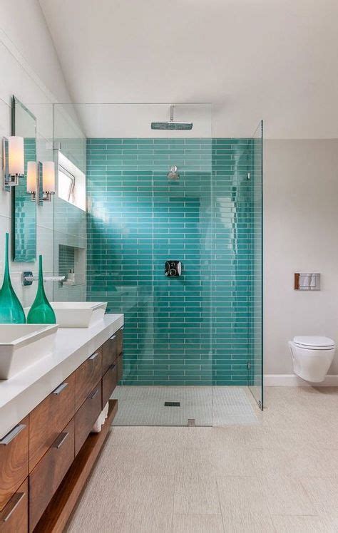 As long as the tile and basic elements of the room are not competing with one another, you can play with different colors and accents until it works. 15 Eye-Catchy Shower Tile Accent Walls - Shelterness