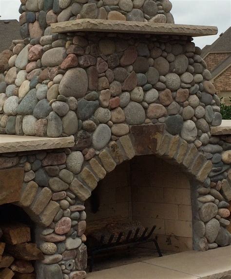 River Rock Fireplace Built By Green Meadows Landscaping River Rock