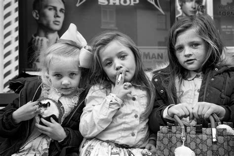 Young Traveller Girls Smoke Candy Cigarettes While Others Glam Up In
