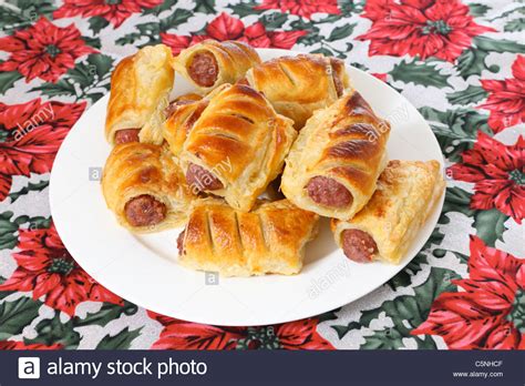 20 recipes for a traditional british christmas dinner. A plate of sausage rolls, traditional British Christmas ...