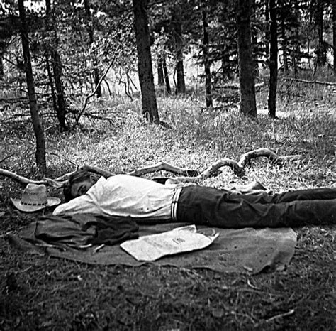 Peel University Of Lethbridge Man Sleeping On A Blanket In A Forest