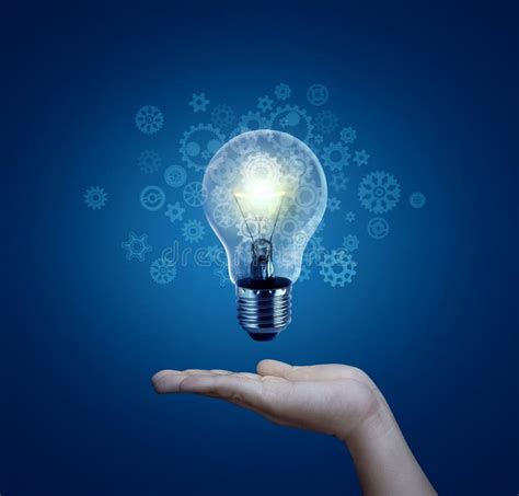 Light Bulb In Hand New Ideas With Innovative Technology And Creativity