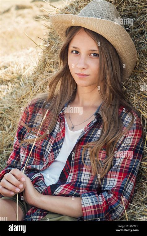 Portrait Of A Young Beautiful Girl In Style Of The Country Girl Poses