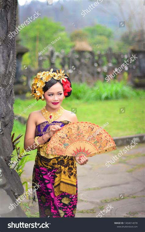 Balinese Couple Using Traditional Balinese Wedding Stock Photo