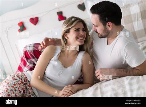 Young Attractive Couple Having Romantic Time In Bed Stock Photo Alamy