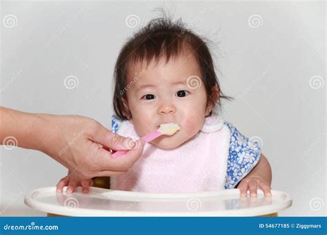 Japanese Baby Girl Eating Baby Food Stock Image Image Of Year Cute
