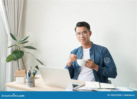 Young Asian Architect At Work Smiling To Camera Stock Photo Image Of