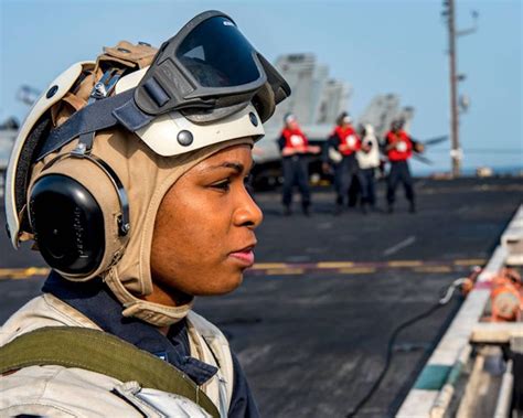 hospital corpsman 1st class samone thorne a medical observer stands watch on the flight deck