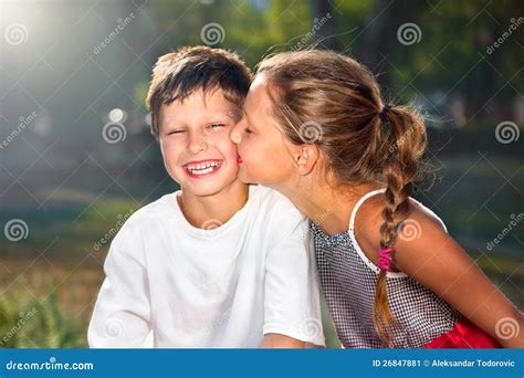 Girl Kissing Boy Stock Image Image Of Happy Smiling 26847881