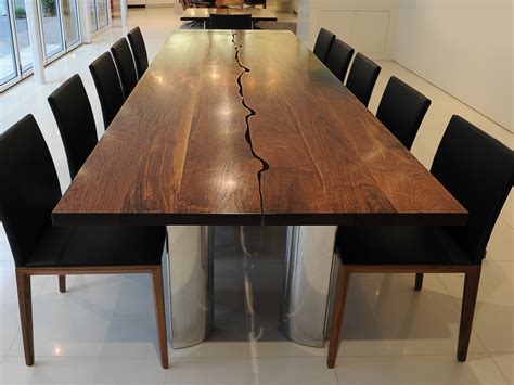 They are customized to meet each customer's needs. Bespoke Dining or conference Table in solid walnut | Makers' Eye