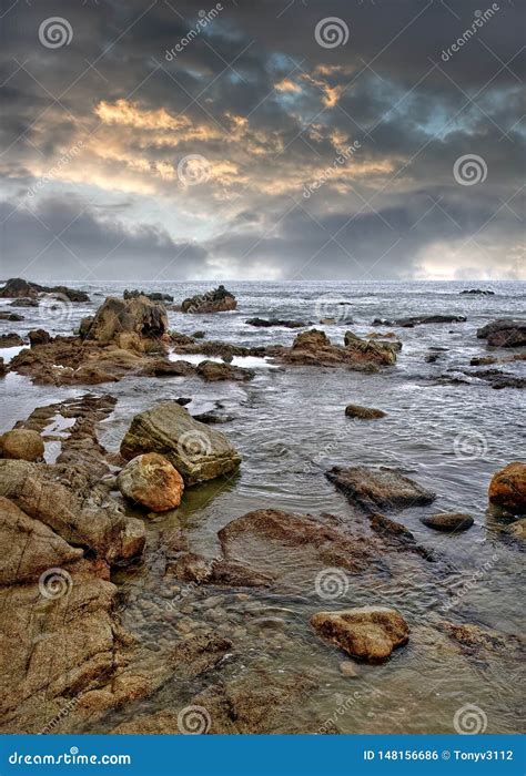 Tranquil Seashore With Rocks Just Before A Storm Hainan Island China