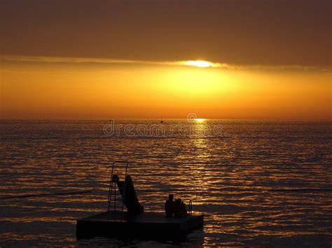 Beautiful Ocean Sunset With Silhouttes Stock Photo Image Of Sunset