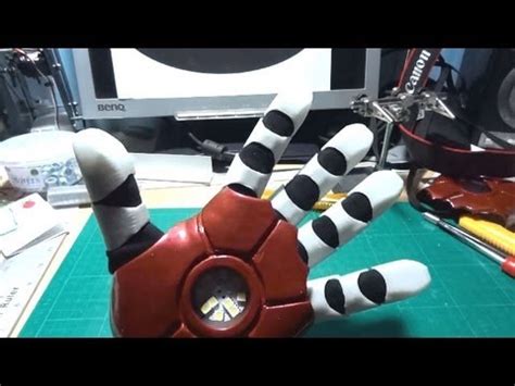 An iron man glove is radically different in that the metal is fully enclosing. Iron Man Power Suit #32 | Glove Testing | James Bruton - YouTube