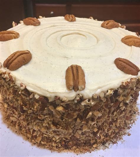 This red velvet cake is similar to the one that started the craze in the 1940s. Red Velvet Cake with Cream Cheese Icing garnished with Toasted Pecans : Baking