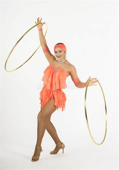A Charming Girl Performs Circus Elements With A Hula Hoop Stock Image