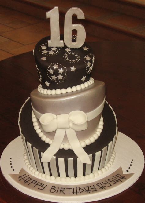 A pale pink ribbon, piano keys, and swiss dots highlight this sweet 16 birthday cake. Let Them Eat Cake: Black & Silver 16th Birthday cake