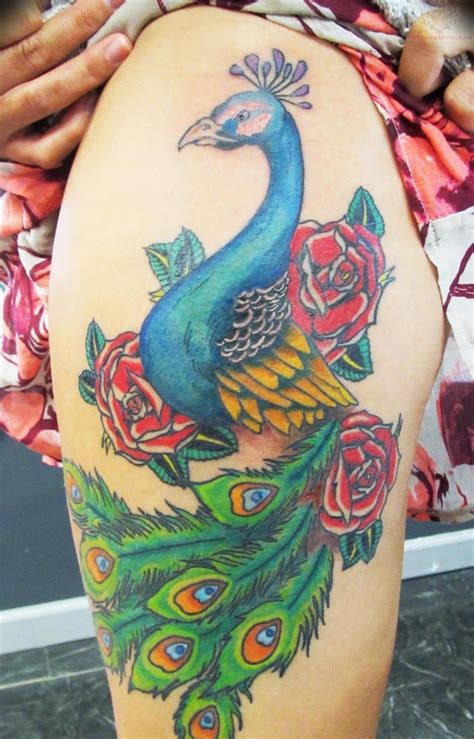 They can also be a symbol of protection, power, and strength. Peacock Tattoo Images & Designs | Peacock tattoo, Back ...