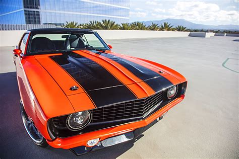 Hot Chevy Camaro Benefits From Bright Orange Paint And Contrasting Race