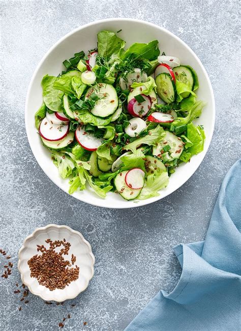Mixed Greens Salad With Cucumber Radishes And Herbs