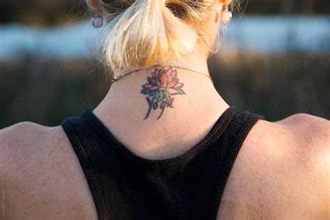 Blonde Woman With Tattoo On The Back Of Her Neck Del Colaborador De Stocksy Curtis Kim Stocksy