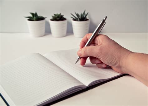 Pen On Notepad Paper · Free Stock Photo