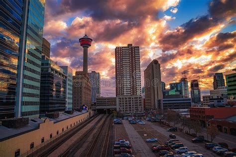 Colorful Cloudy Sunrise Over Downtown Calgary Editorial Photography