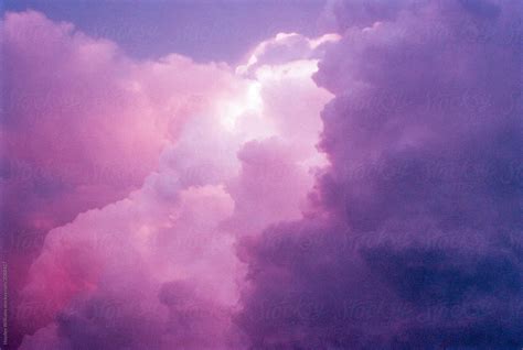 Surreal Purple Sunset Sky Filled With Clouds Stocksy United