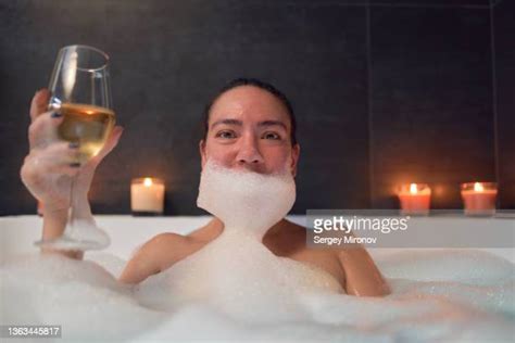 Woman Taking A Bubble Bath Photos And Premium High Res Pictures Getty Images
