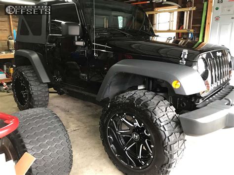 2009 Jeep Wrangler With 20x12 44 Hostile Alpha And 35125r20 Nitto