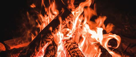 Download Wallpaper 2560x1080 Bonfire Logs Fire Flame Dark Dual Wide