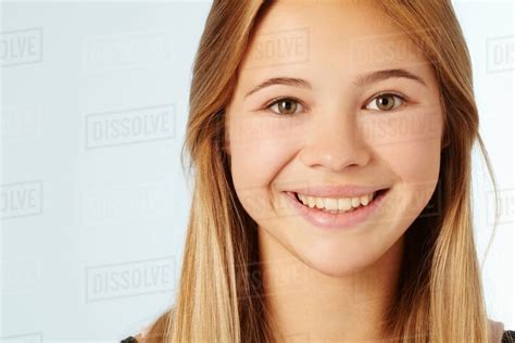 Close Up Of Teenage Girls Smiling Face Stock Photo Dissolve