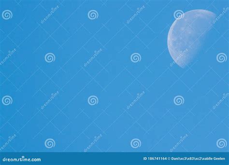 Half Moon In The Morning Daylight With Blue Sky Stock Photo Image Of