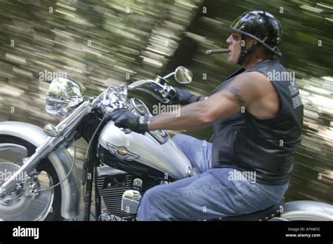 Man Smoking Cigar Riding Harley Davidson Motorcycle Californiausa