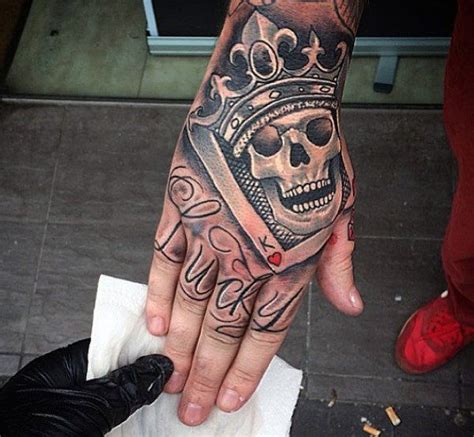 Top 99 Crown Tattoo Ideas [2020 Inspiration Guide] Hand Tattoos For Guys Crown Hand Tattoo