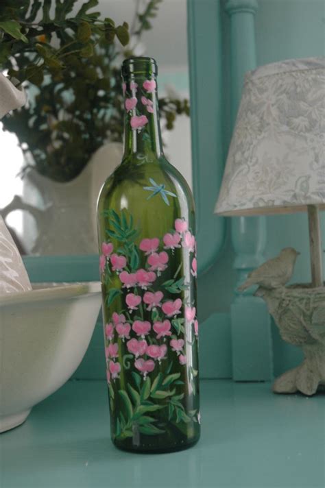 Here Is A Hand Painted Wine Bottle That I Did With Pink Bleeding Heart Flowers Covering