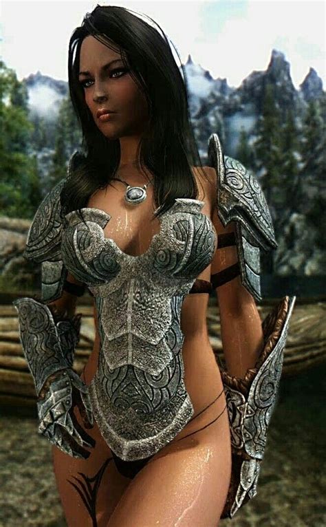 A Woman In A Bodysuit With Armor And Chains