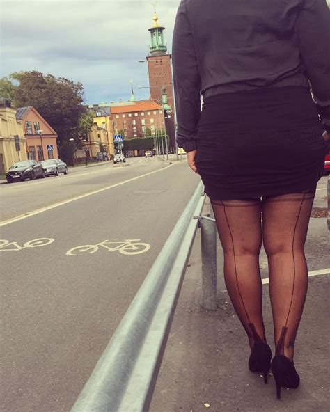 stunning stockholm city hall with seamed stockings