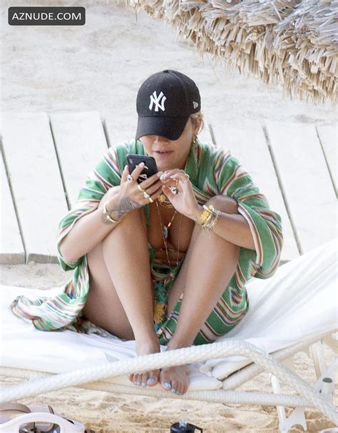 Rita Ora Enjoying A Refreshing Dip In The Sea While On Her Summer