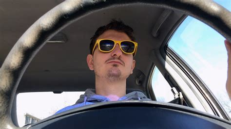 Young Man With Sunglasses Driving Car On Sunny Day 4k Stock Video Footage Storyblocks