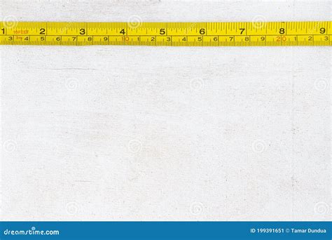 Metal Ruler Centimeters And Millimeters On The Yellow Ruler Stock