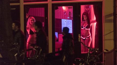 amsterdam sex workers oppose ban on notorious window brothels