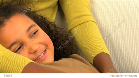 African American Woman Tickling Her Cute Daughter Motion Jib Stock