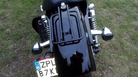 I would think a black night train or a black fatbob. Harley Sportster Grim Reaper - YouTube